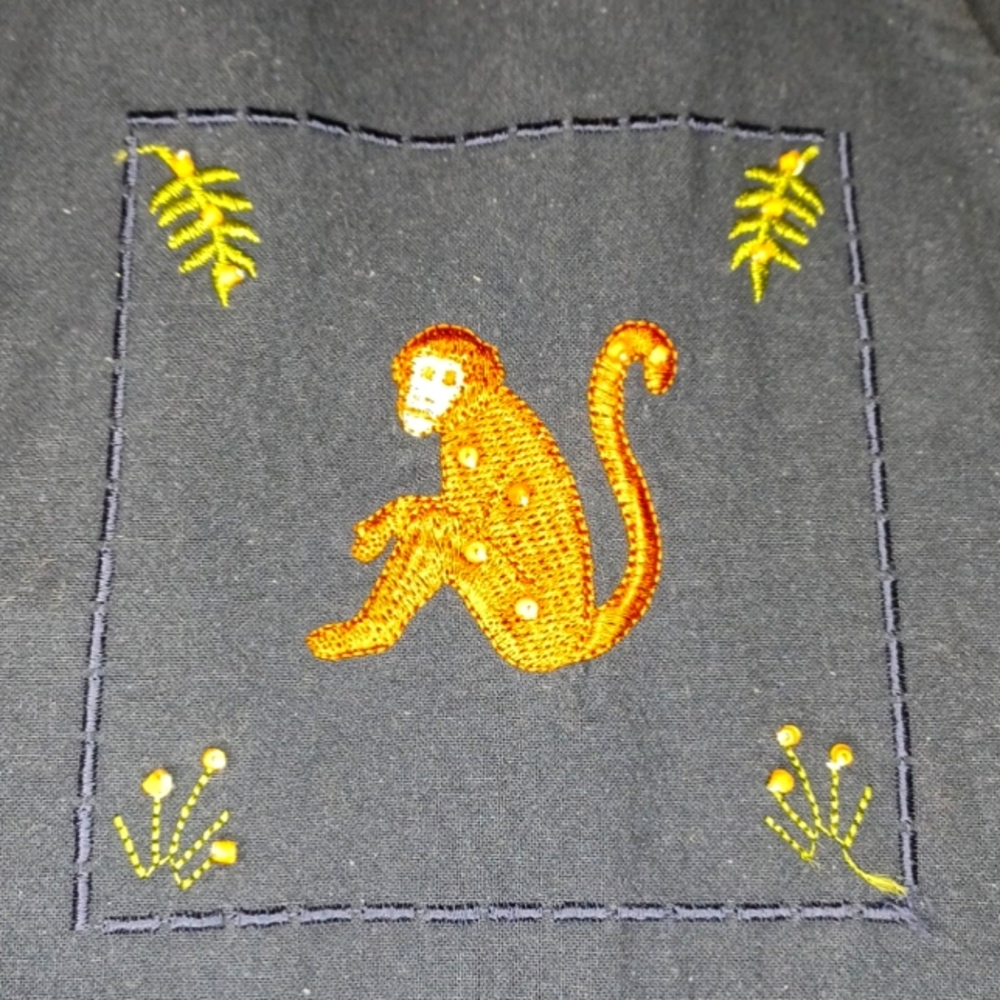 Navy Cotton top  with embroidered animals.